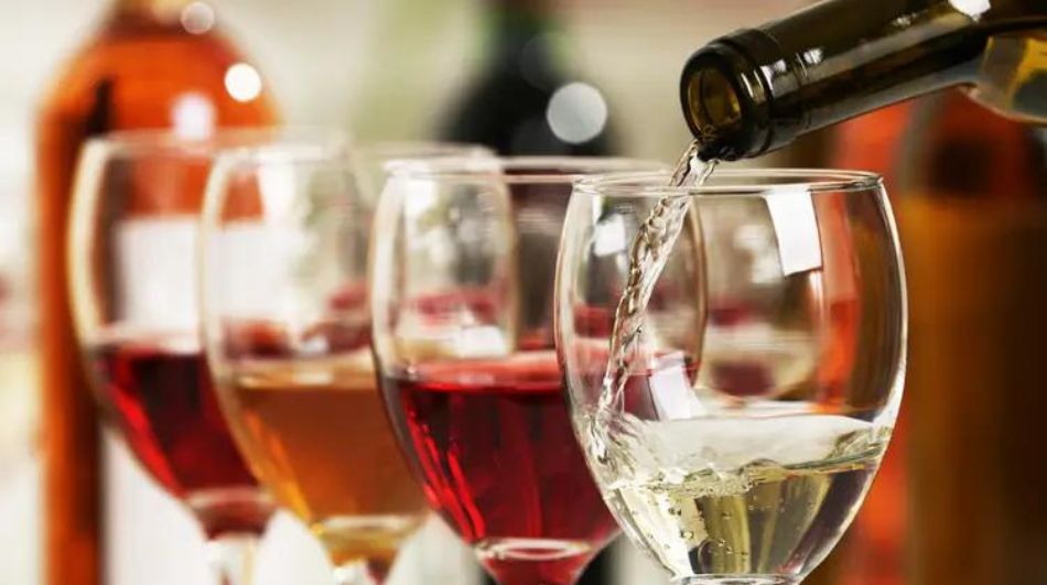 Wine being poured into a tasting glass